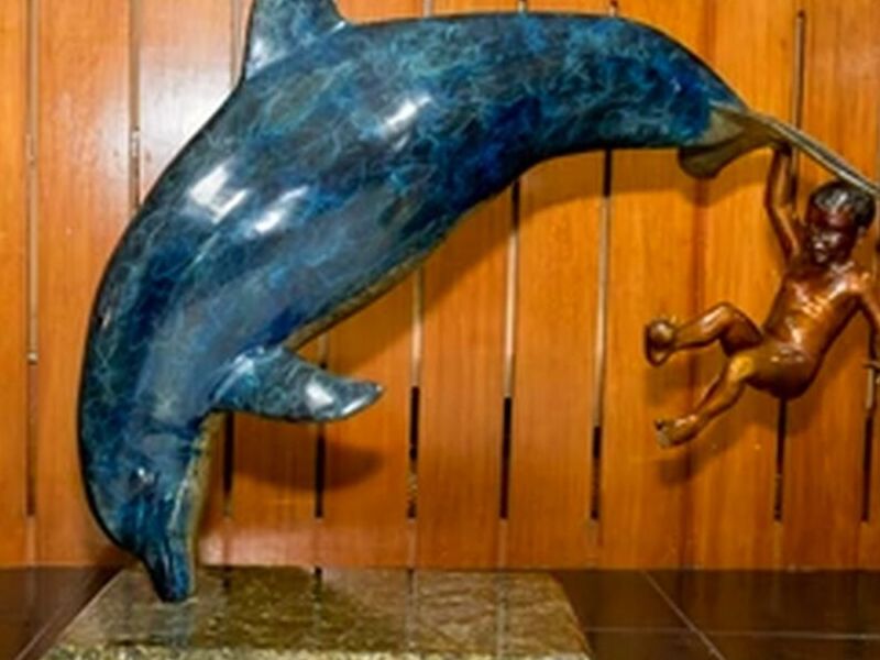 Escultura Delfín con niño México