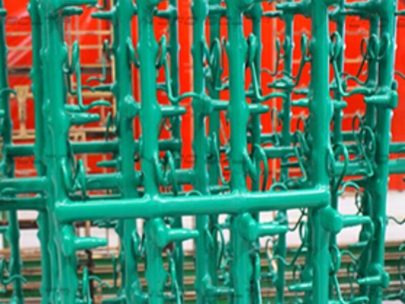 Ajuste de racks para cromado y pintura.