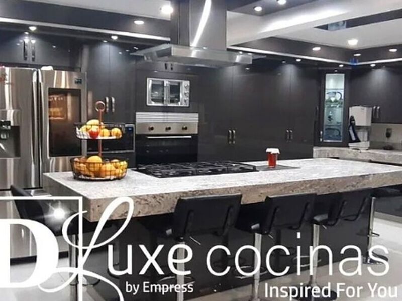 Muebles negros mesones granito gris cocina