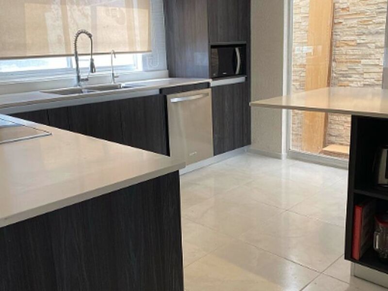 Muebles madera negro mesón blanco