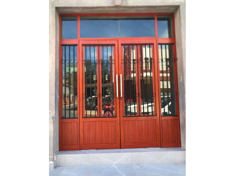 puerta aluminio naranja Monterrey Puertas y Ventanas Aluminios joskar