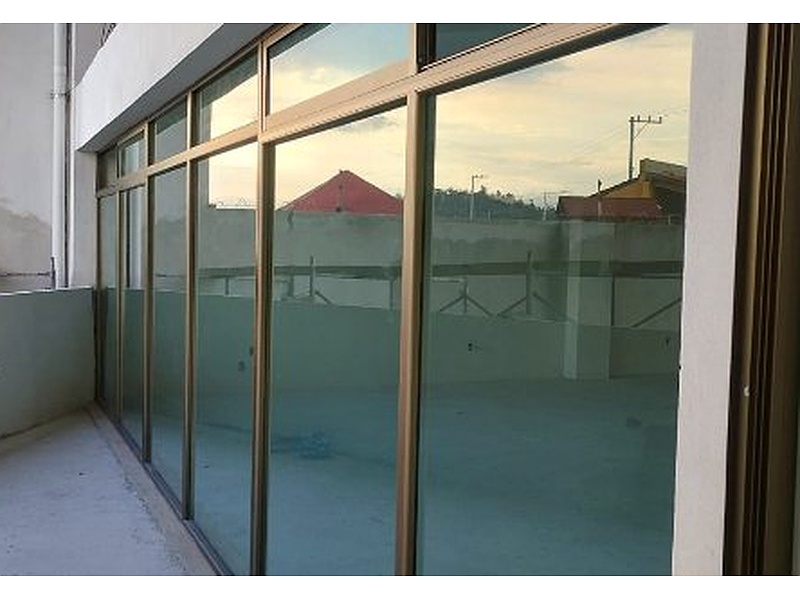 Puertas corredizas para balcones de locales México Alutec Aluminio & Acero