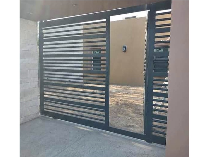 puerta tipo reja Nuevo Laredo Proyectos Y Construcciones Laredo