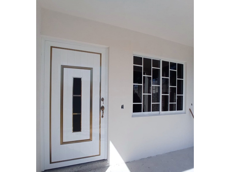Puerta de tambor de aluminio blanco México