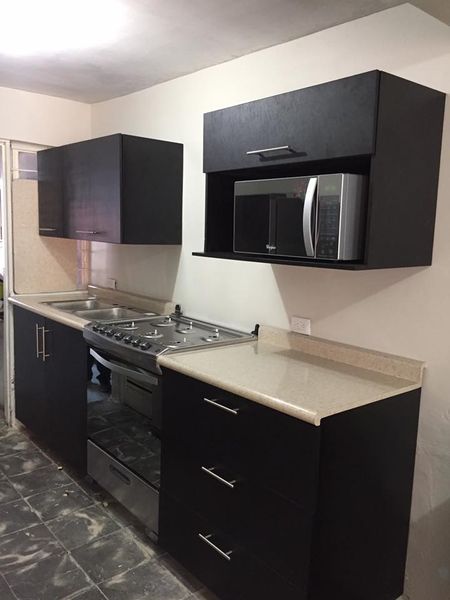 Cocina madera de pino y triplay de Okume