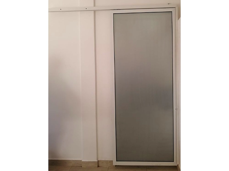 Puerta Corrediza en PVC y Vidrio Esmiralado México
