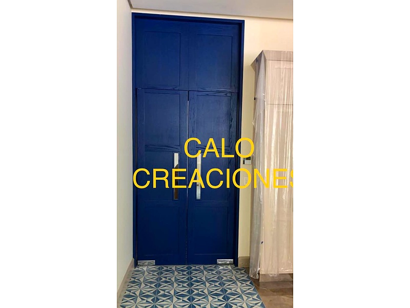 puerta abatible de madera Monterrey CALO Creaciones en madera