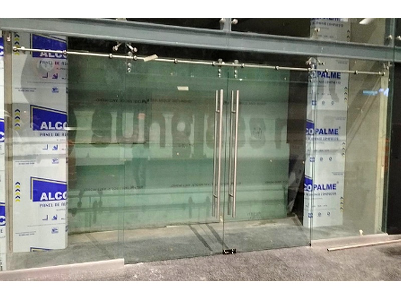 Cancelería doble corrediza CDMX Construcciones y acabados en vidrio