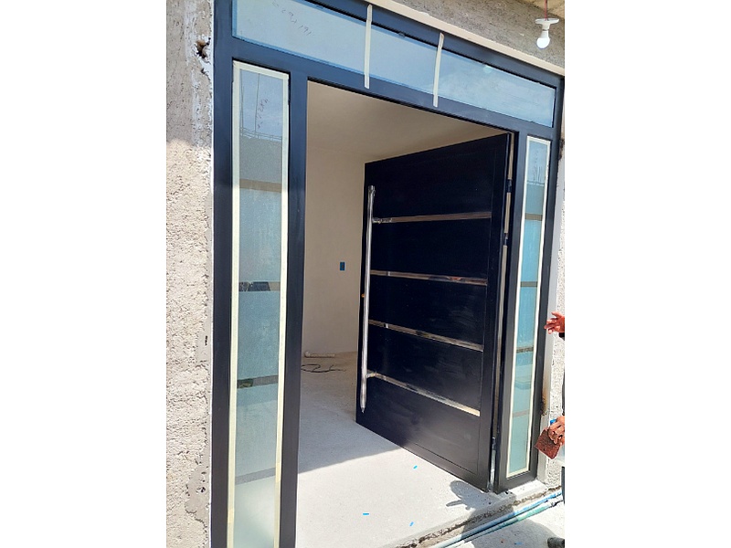instalación de puerta peatonal CDMX Soluciones en Remodelación y Mantenimiento