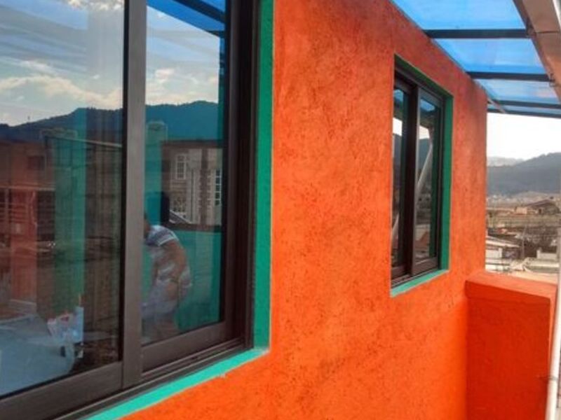 VENTANA PVC TERMINADO MADERA