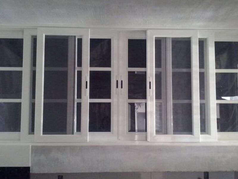 Ventana corrediza en escuadra 