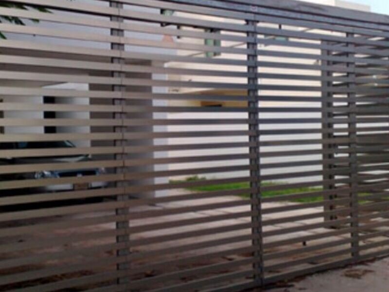 Portón de aluminio VITRO en Cautla