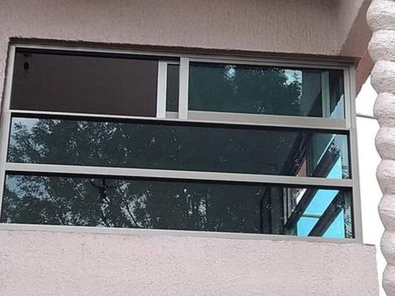 Ventana de vidrio verde en CDMX 