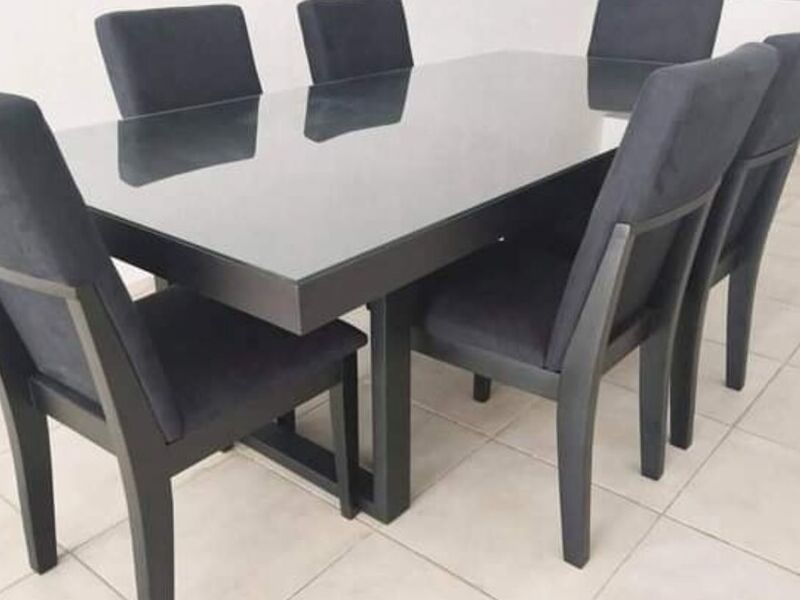 Comedor negro de 6 sillas y vidrio templado