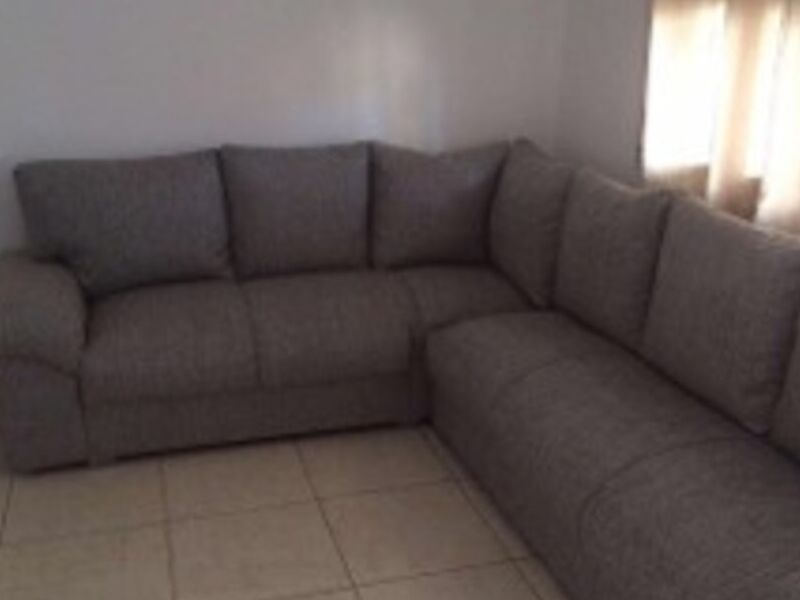Juego de sala en L gris 