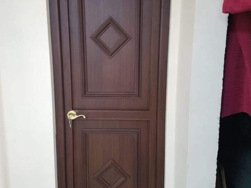 PUERTA DE ALUMINIO NOGAL EN HIDALGO