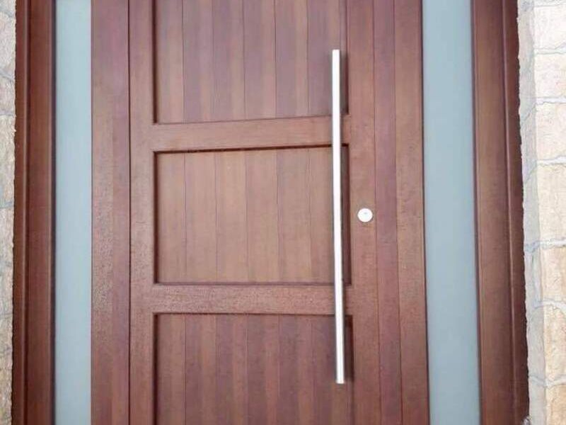 PUERTA RESIDENCIAL NOGAL GUERRERO
