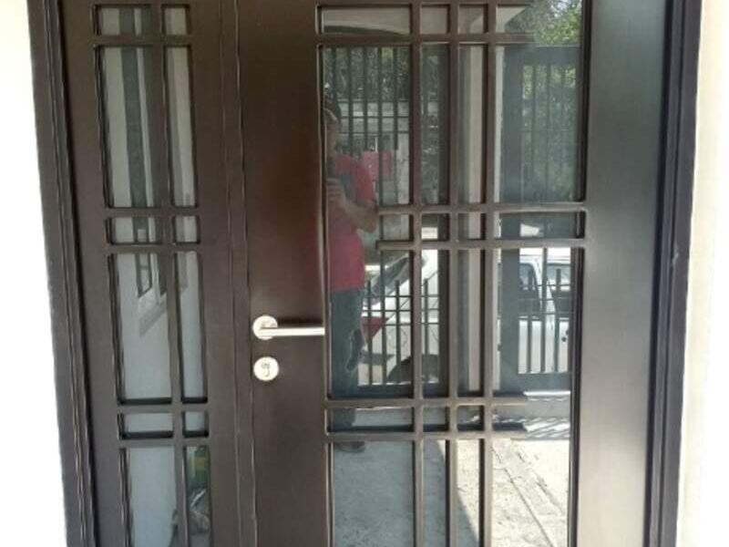 Puerta residencial principal en Xicoténcatl