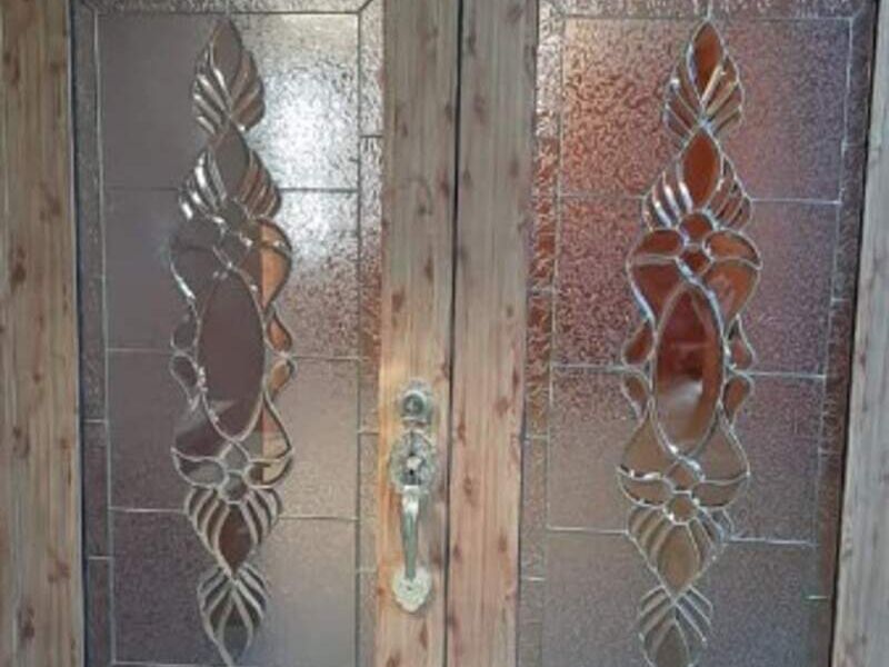 Puerta de madera con diseños en Veracruz