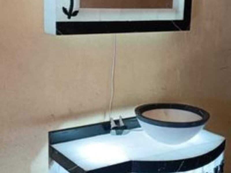 Lavabo ónix blanco con mármol negro México