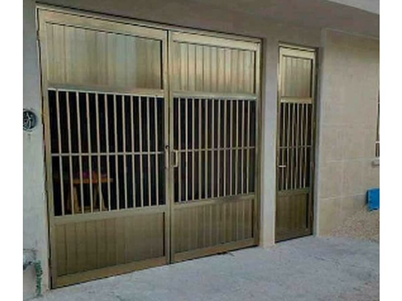 Puerta aluminio para garaje tono dorado Tulum