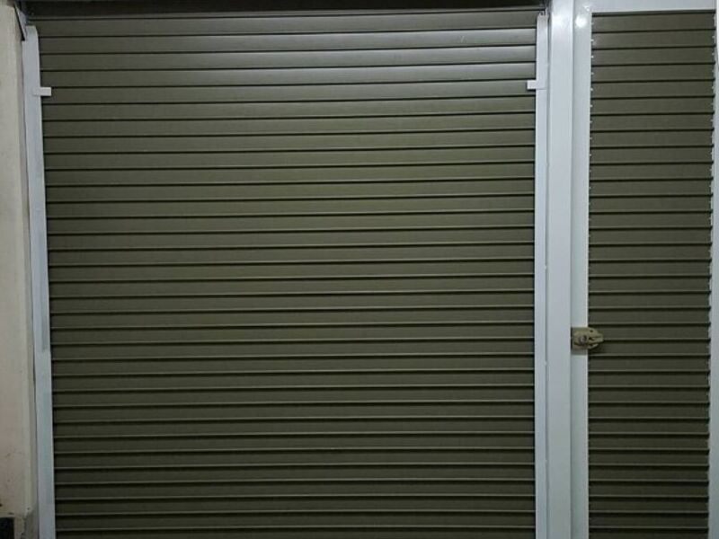 Cortina plana con puerta México