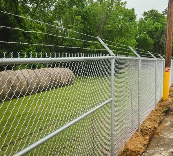 Cercas de mallas ciclónica tejida romboidal para la protección de su hogar o propiedad