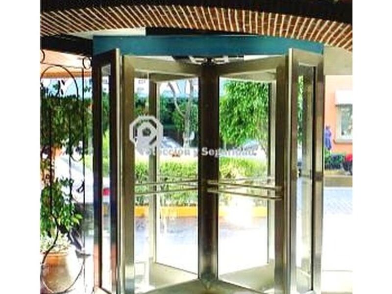 Puerta giratoria cristal cuatro aspas México