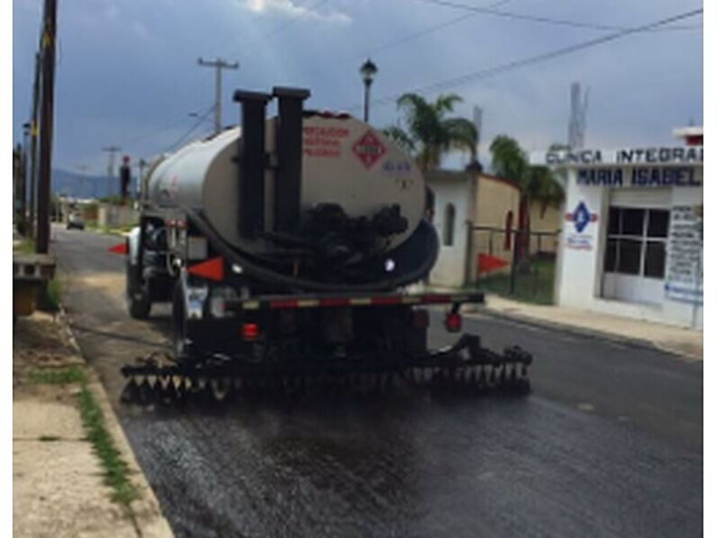 Riego impregnación emulsión aplicado México  