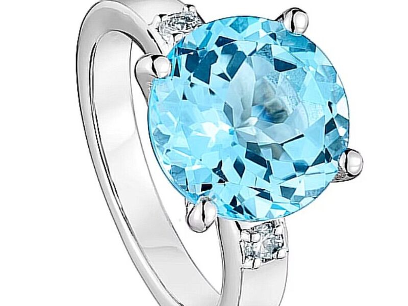 Anillo de plata con diamante y topacio