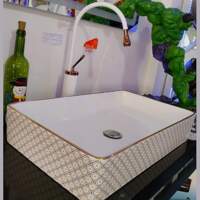 Diseño en muebles para baño y arte en piedra