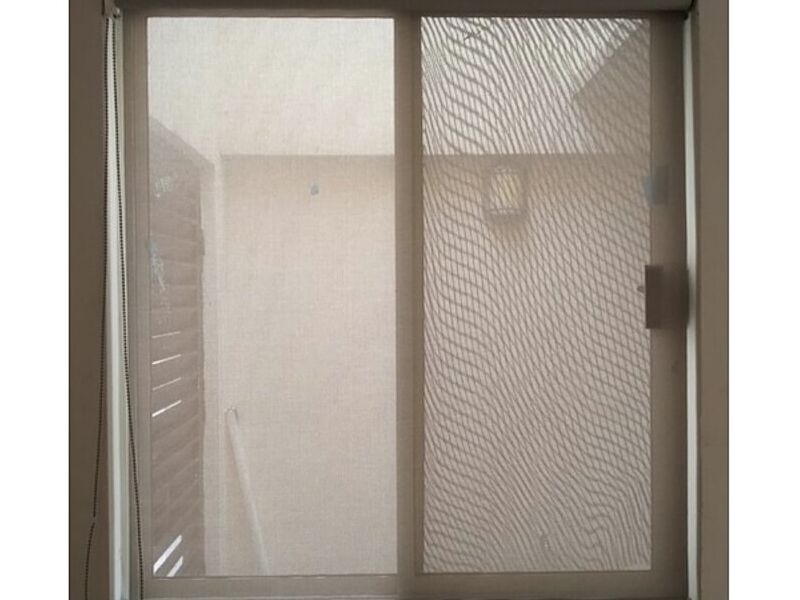 Cortina enrollable gris Saltillo
