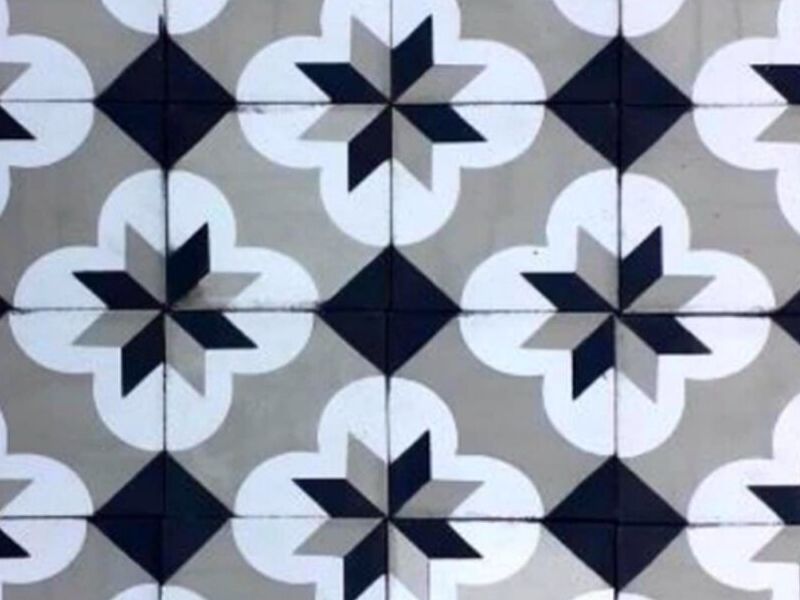 Mosaico diseño flor blanco y negro 