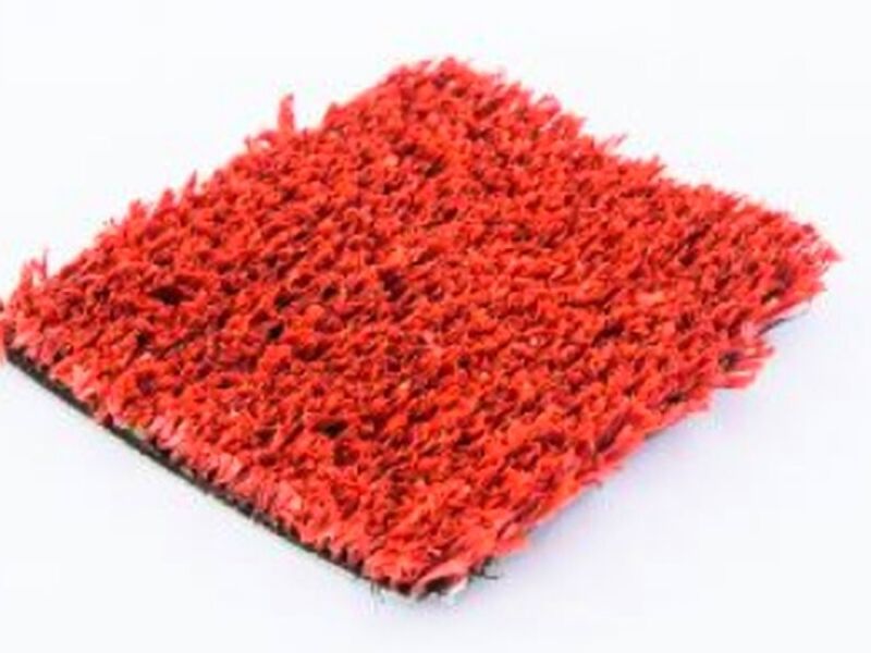 Pasto deportivo rojo